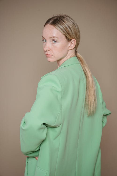 A Woman Wearing a Green Blazer