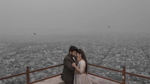 Free Romantic Couple on Rooftop Stock Photo