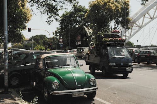 Free Green Volkswagen Beetle Parked on Roadside Stock Photo