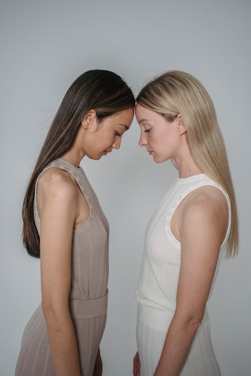 Women with their Heads on each other