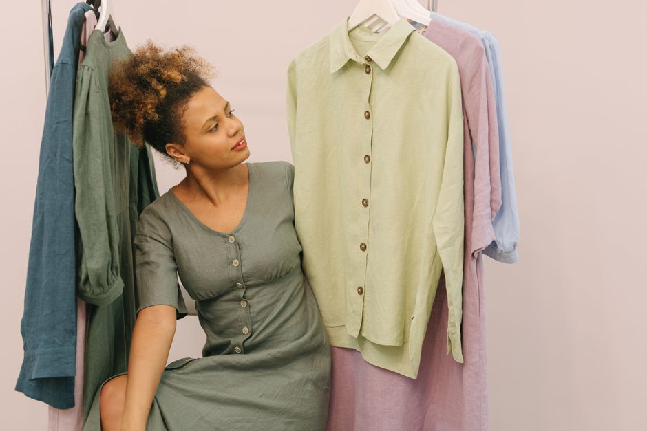 Linen dresses on hangers in a boutique