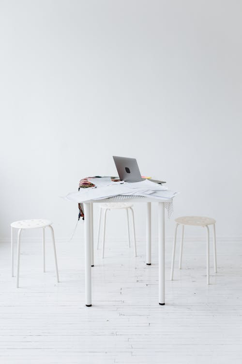 White Chairs and Table as a Workspace