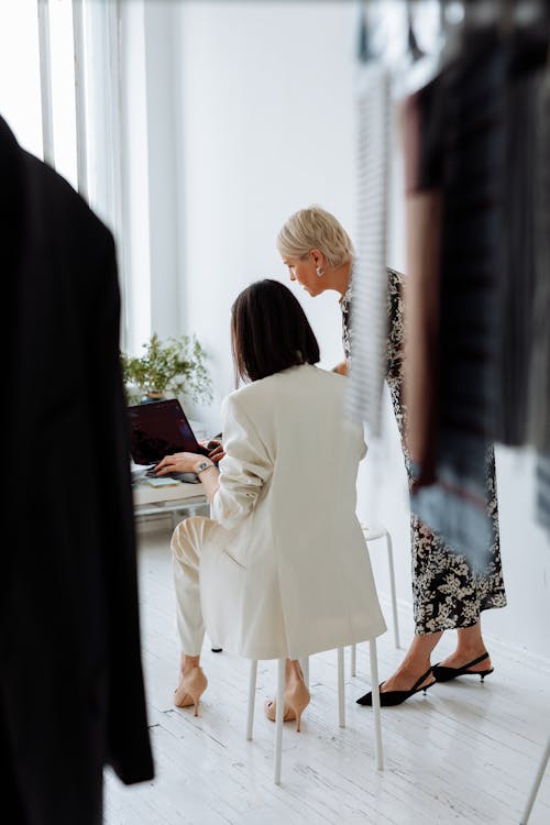 Women Discussing in a Fashion Store