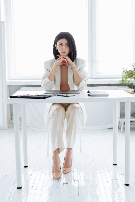 How To Stay Motivated In Your Career Journey? 11 Person Reviewing Career Goals On A Notepad