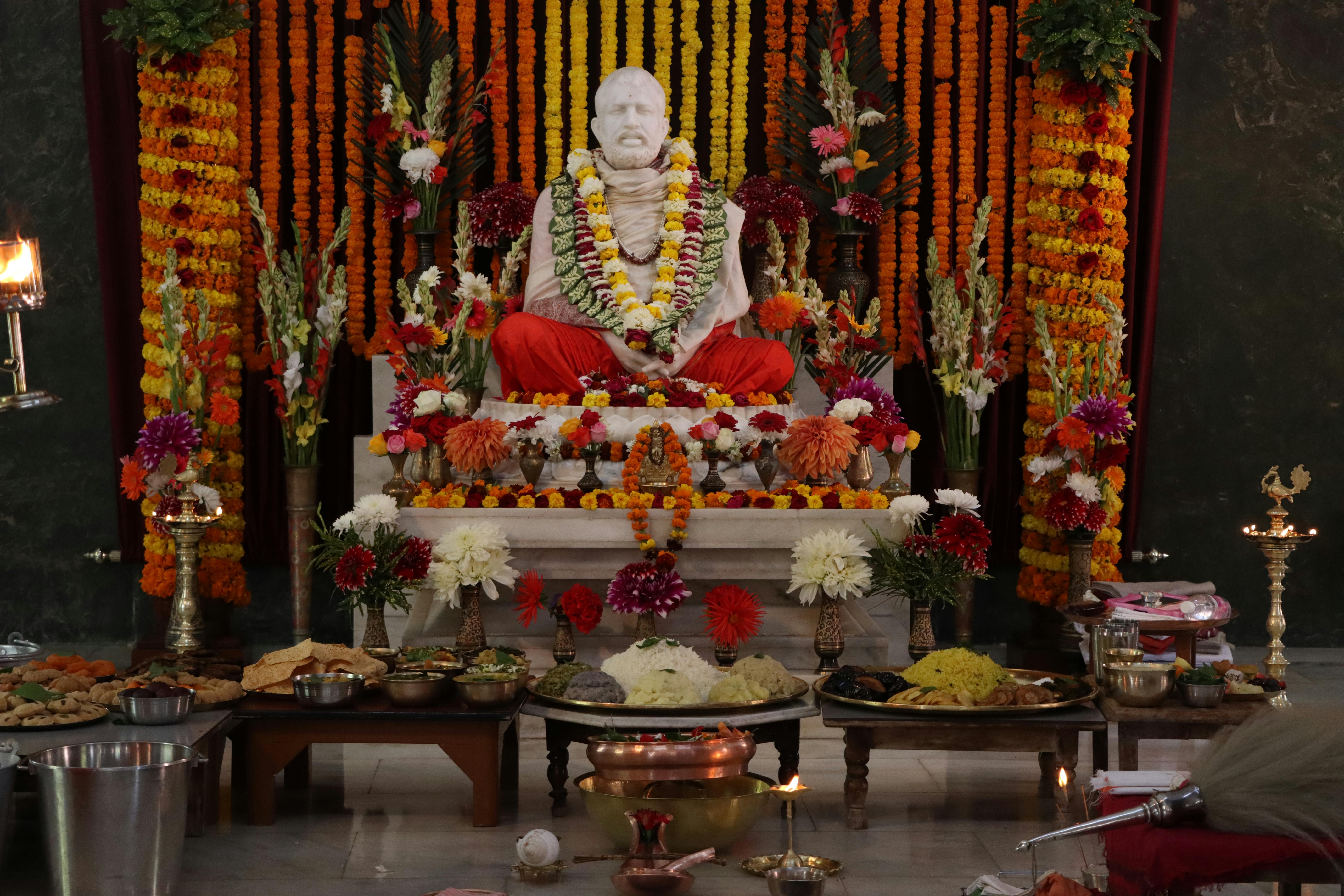 Free Gold Buddha Figurine on Brown Wooden Table Stock Photo