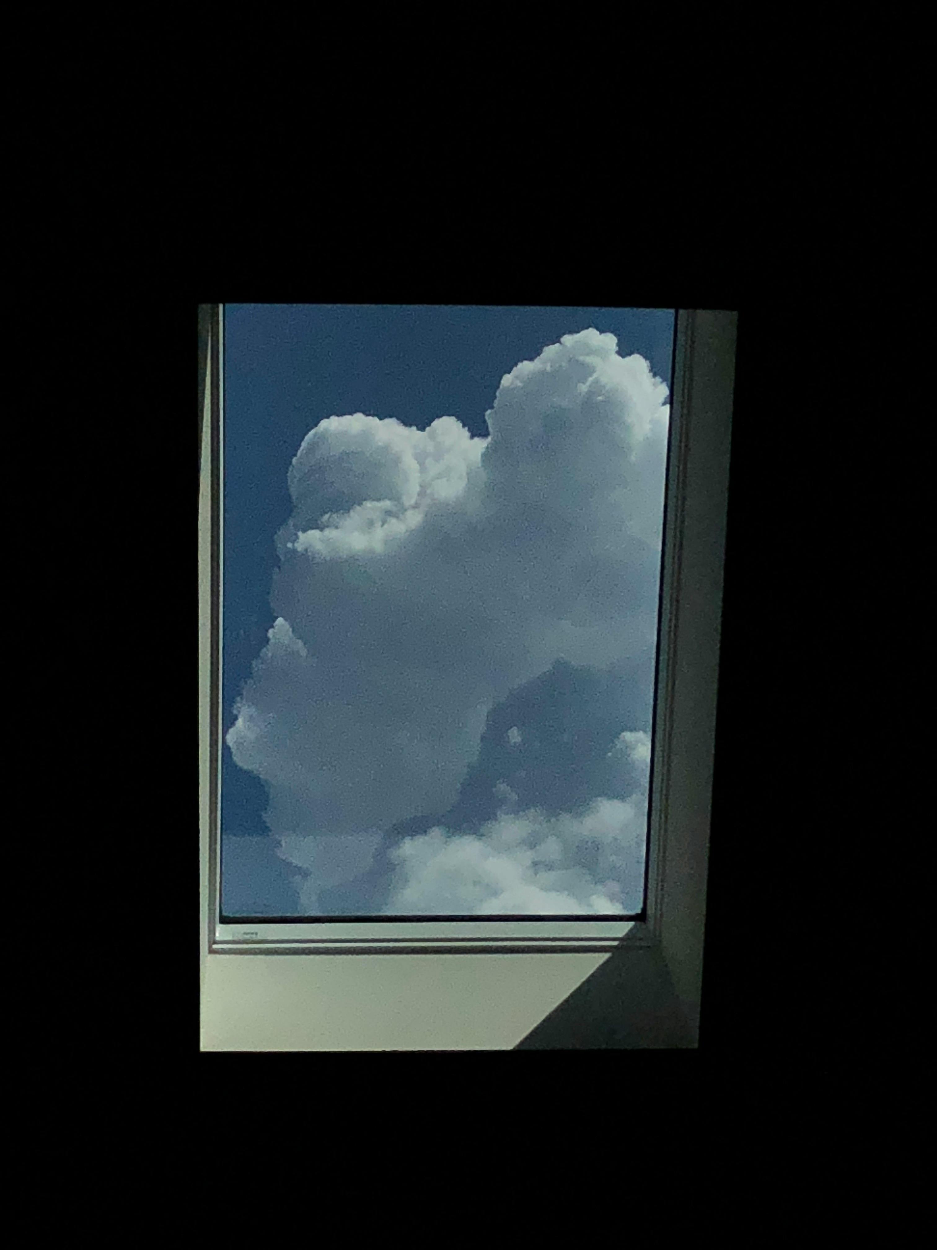 Skier at the finish area hugging a teammate or coach