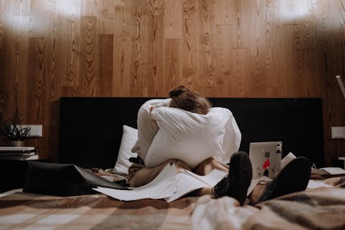 A Woman Crying at the Pillow