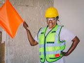 Handywoman Holding a Signal Flag