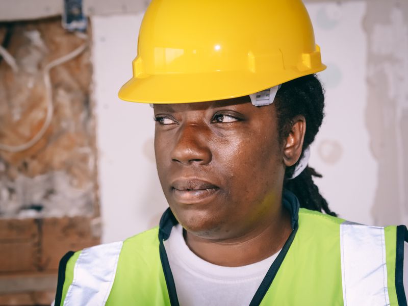 Denise Carter, safety officer, inspecting equipment