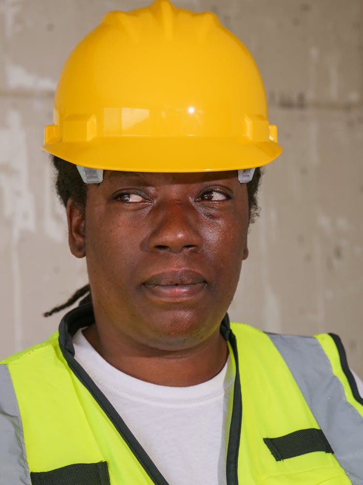 Female Engineer In Yellow Hardhat 