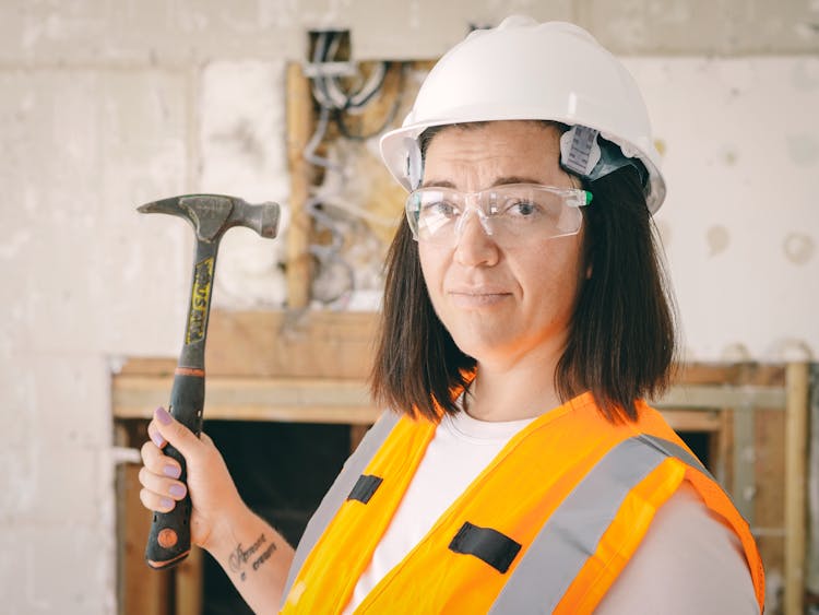 Handywoman Holding A Hammer