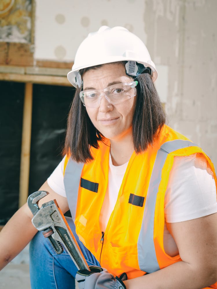 Handywoman Holding A Plumbers Wrench