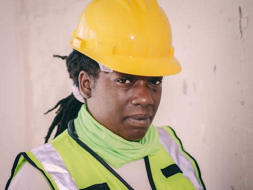 Free Female Engineer in Yellow Hardhat  Stock Photo