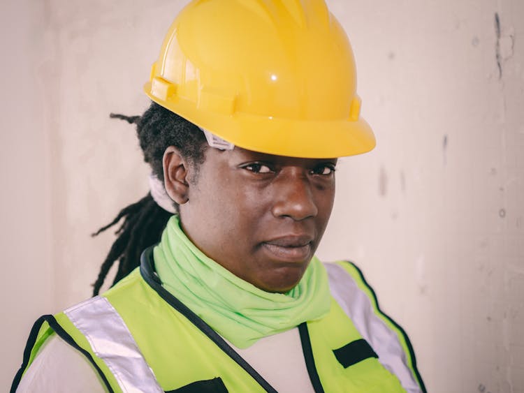 Female Engineer In Yellow Hardhat 