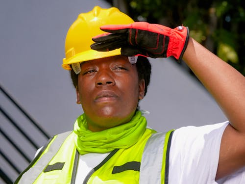 Free Close Up Photo of Female Engineer in Yellow Hardhat  Stock Photo