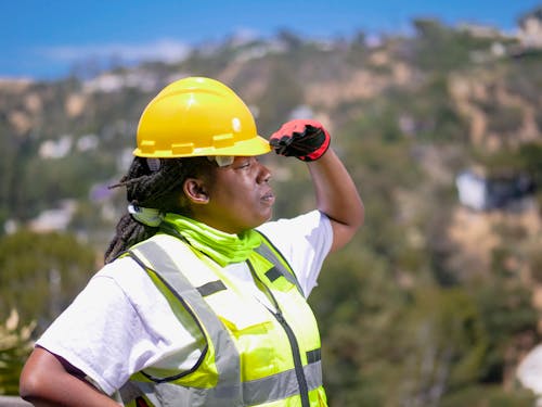 Free Yellow Hardhat Worn by a Woman Engineer Stock Photo