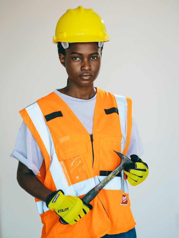 Handywoman Holding A Hammer