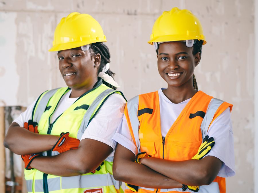 Two Cedarline Surfaces crew members smiling on site