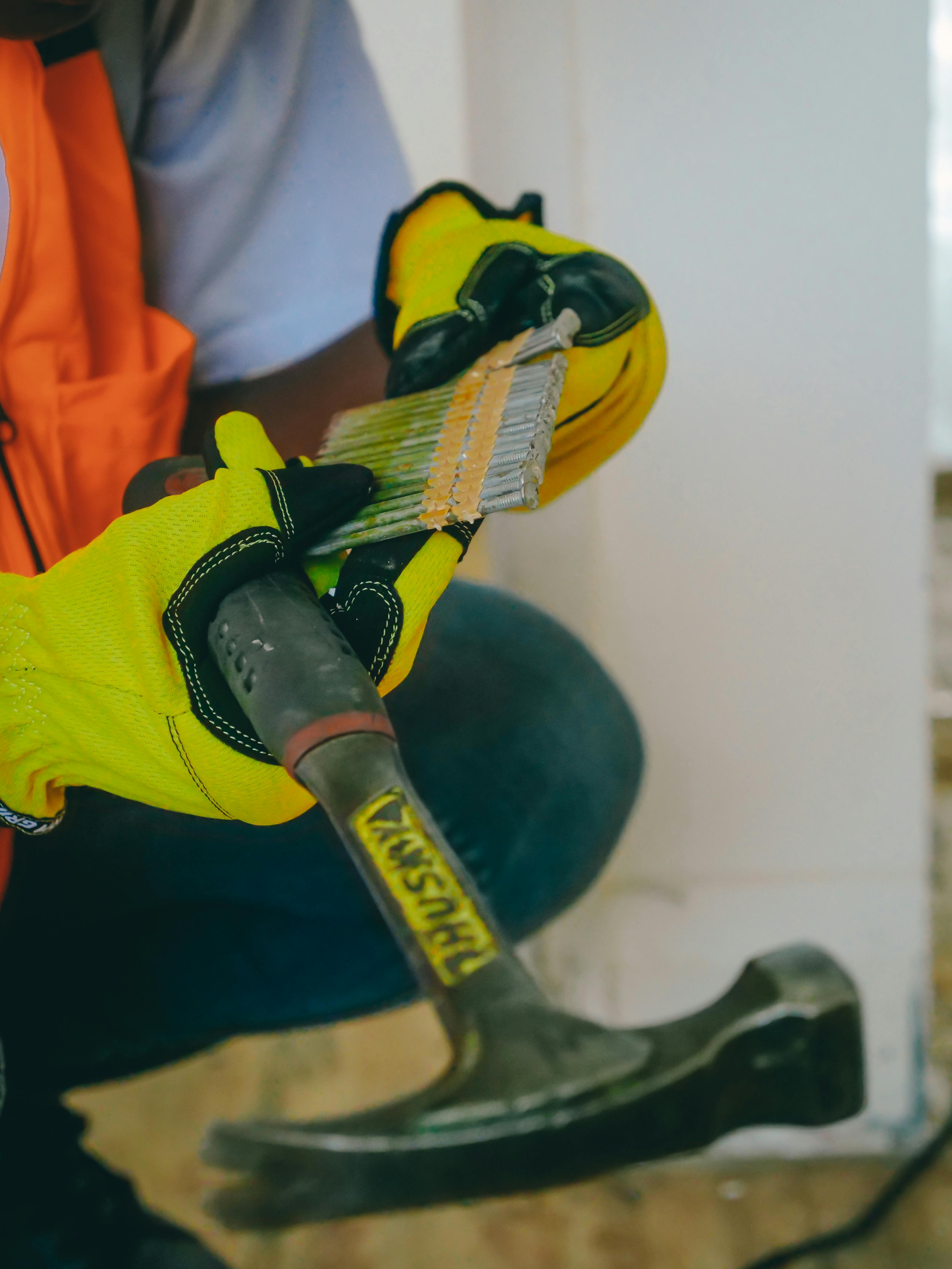 Person Holding Hammer · Free Stock Photo