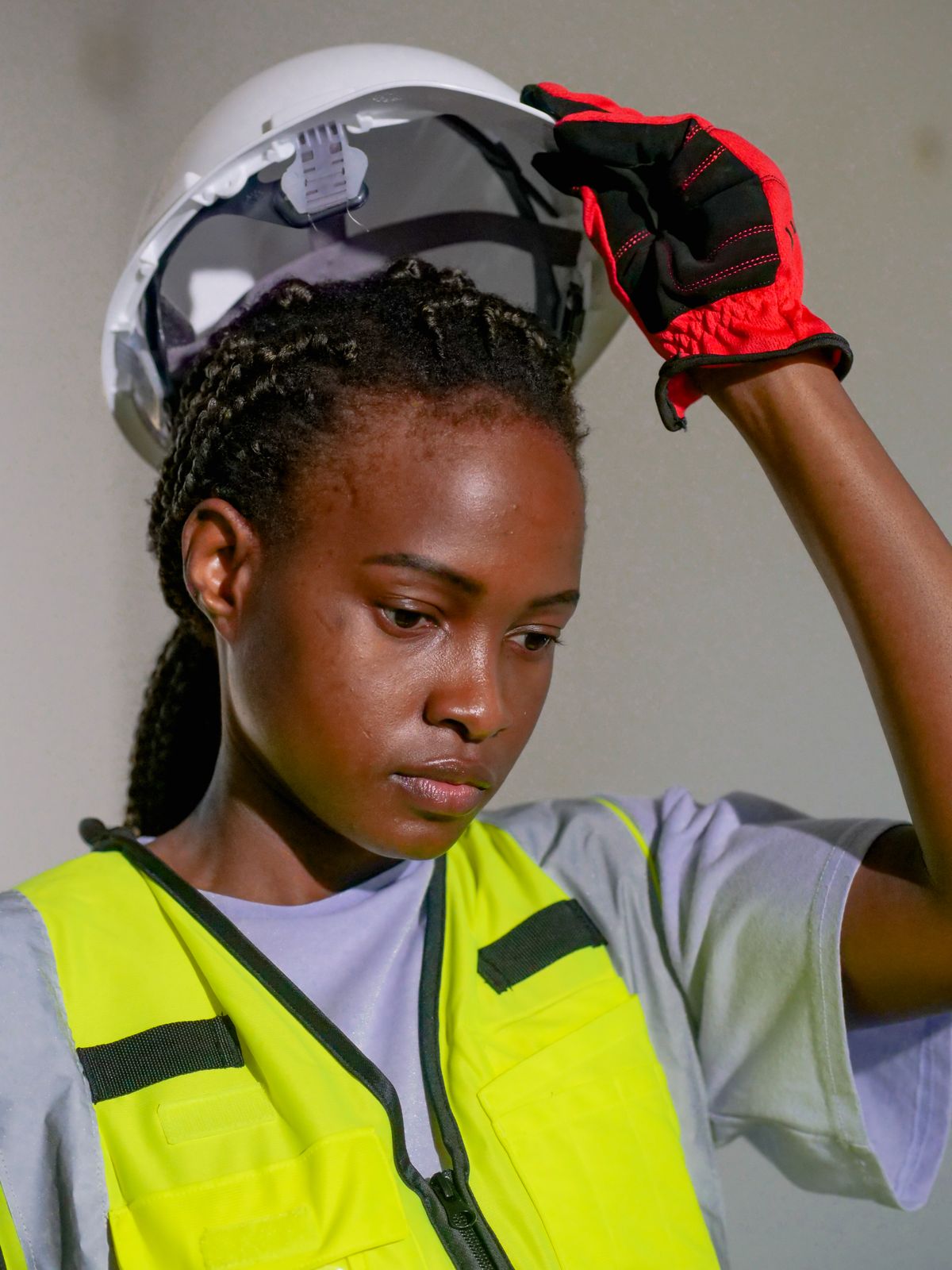 Black female engineer wearing protective equipment