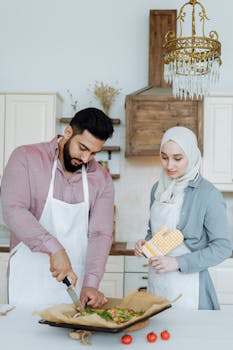 A Muslim couple preparing a meal together in their kitchen, demonstrating love and culinary skills.