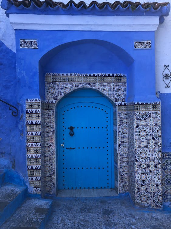 Blue Wall with Blue Wooden Door · Free Stock Photo