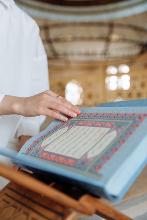 A Person Holding a Book