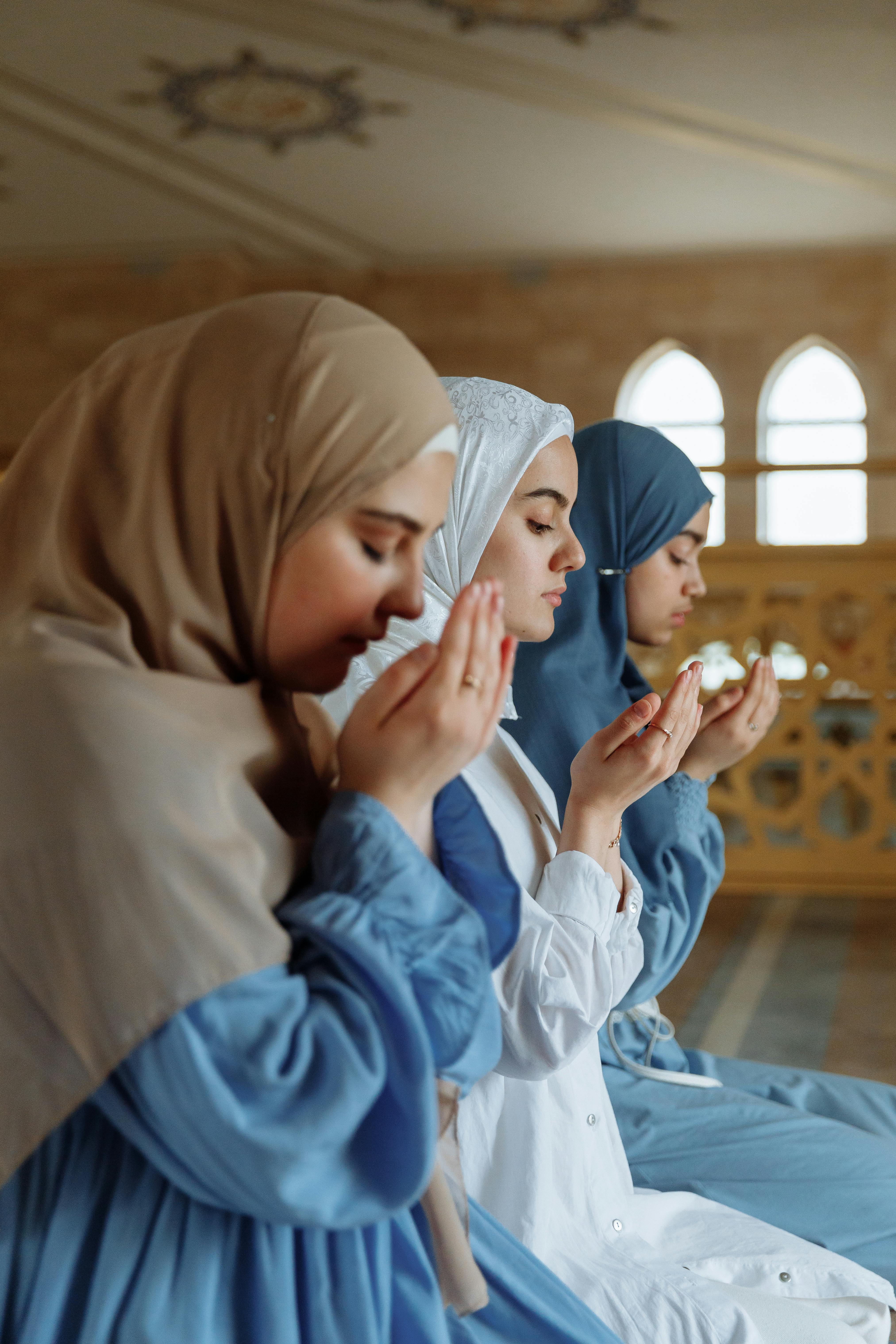 women praying together