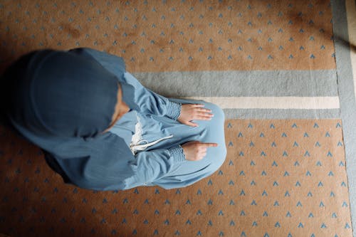 A Woman in Blue Hijab