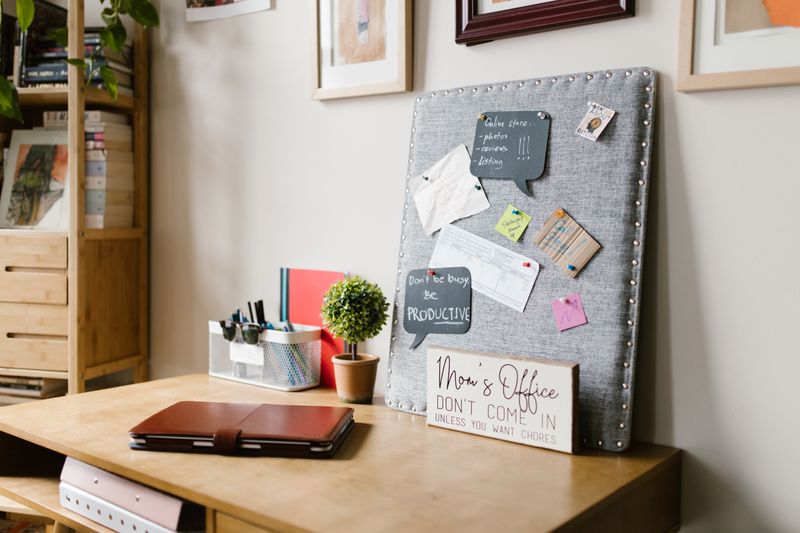 small L-shaped corner desk fitted into a bedroom corner