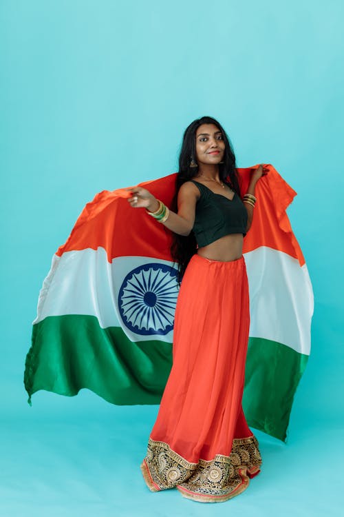 Photo of Woman Holding a Flag