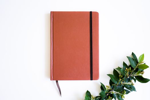 Red Book on White Table