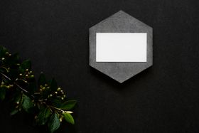 Blank card on a stone holder against a dark background — photo by PNW Production on Pexels
