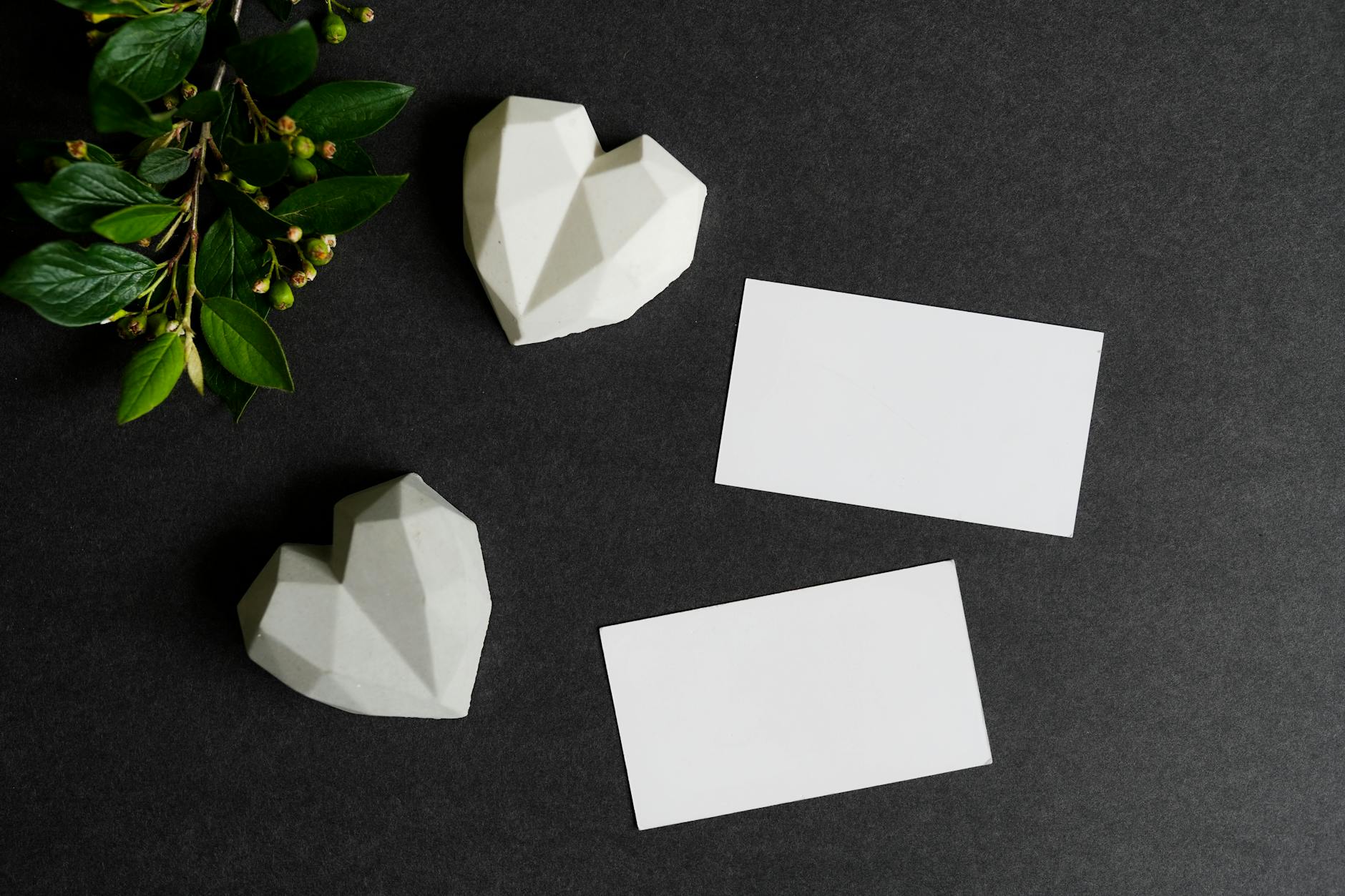 White Papers Besides Heart Shape Paperweight