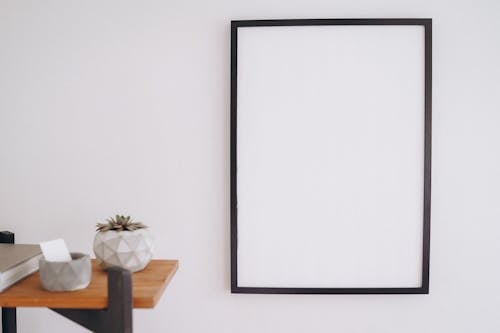 A Blank Frame hanging on the Wall
