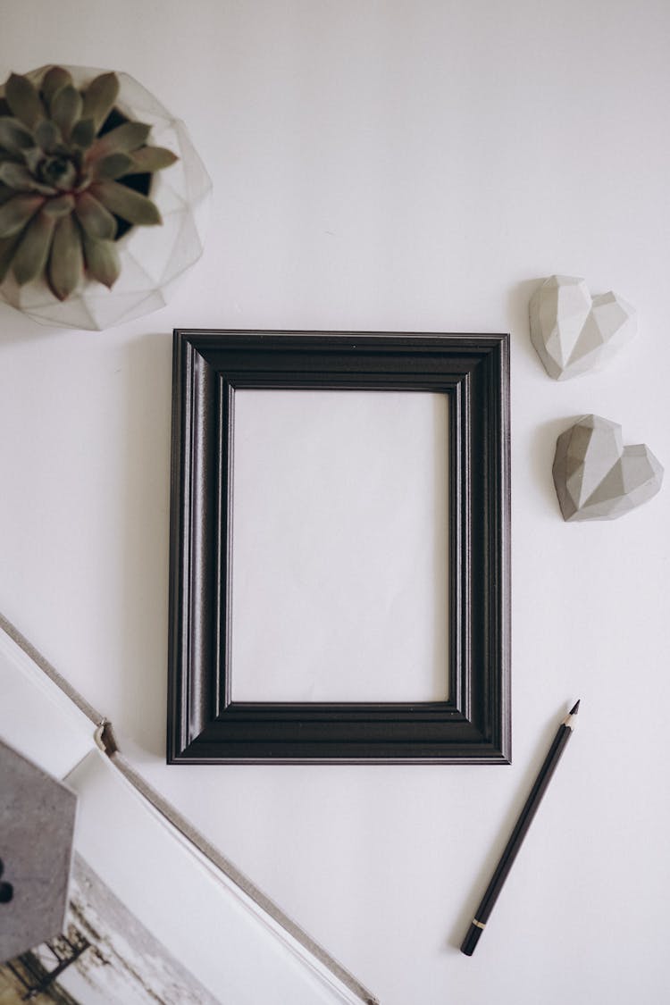 Empty Picture Frame Lying On Table