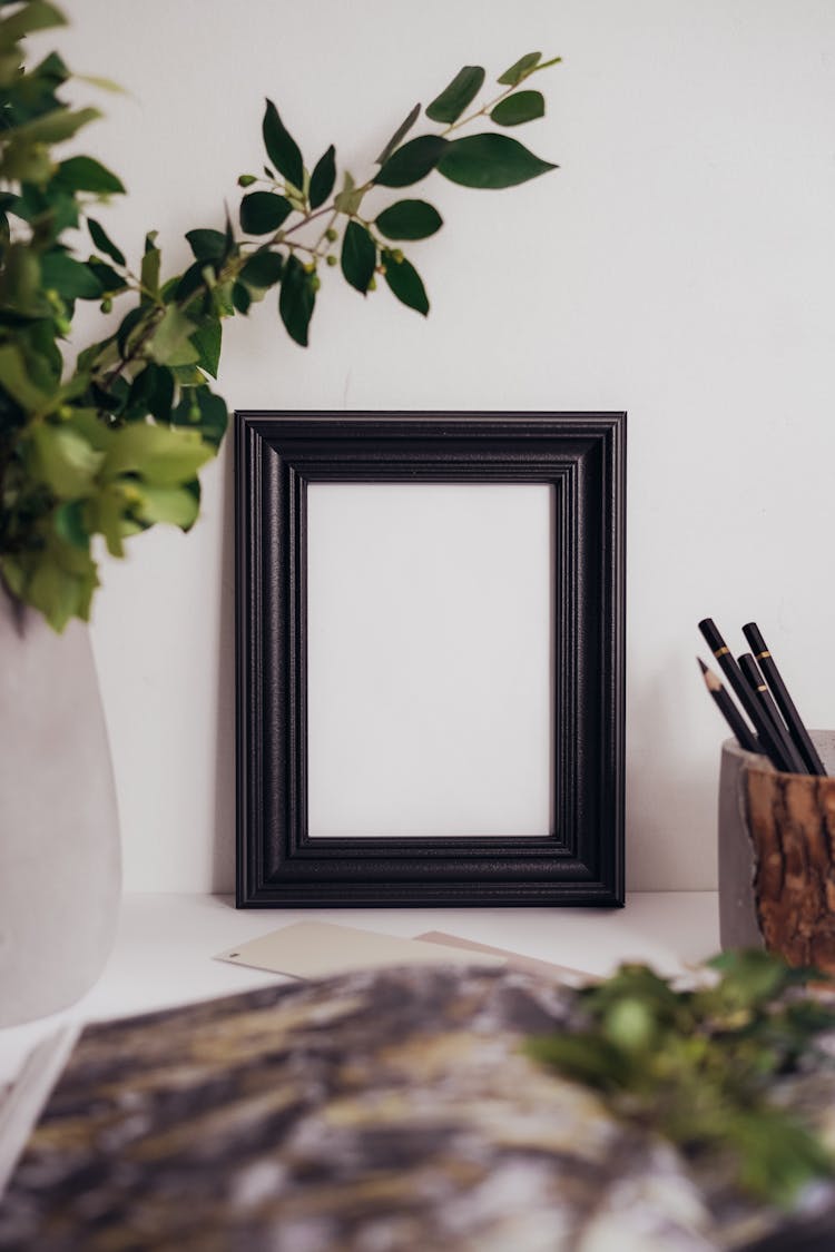 Empty Picture Frame On Desk