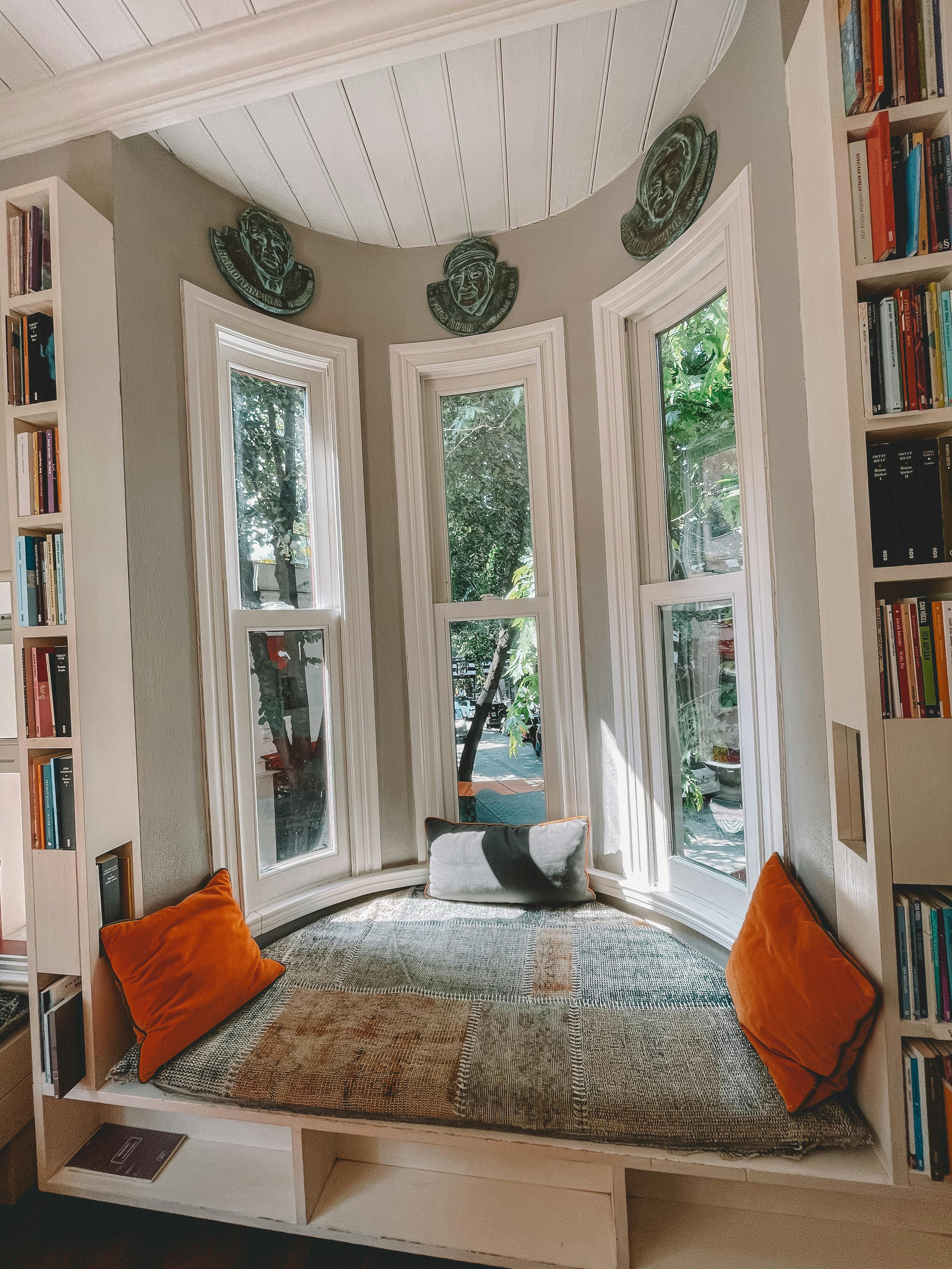 cozy nook by large windows in living room