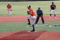 A Pitcher Standing on One Leg