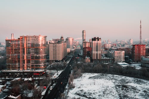 White and Red High-rise Building during Winter Season