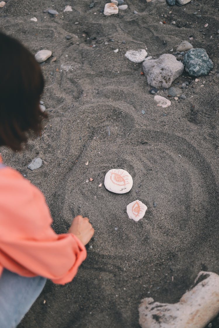 Painted Rocks On Sand