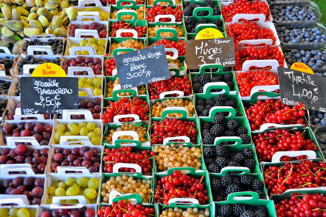 Stack of Fruits With Signage