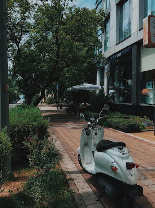 Motorcycle Parked on the Sidewalk