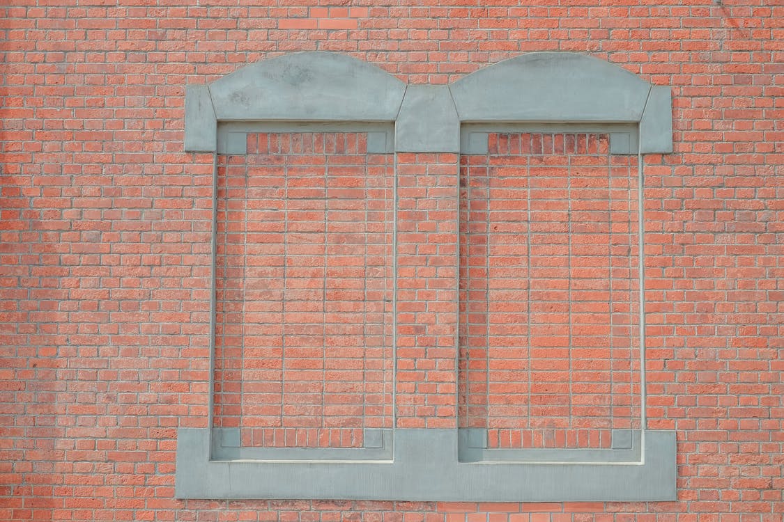 Bricked Up Windows of Building · Free Stock Photo
