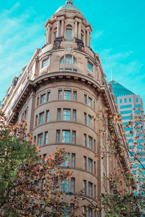 Brown Concrete Building with Curved Façade