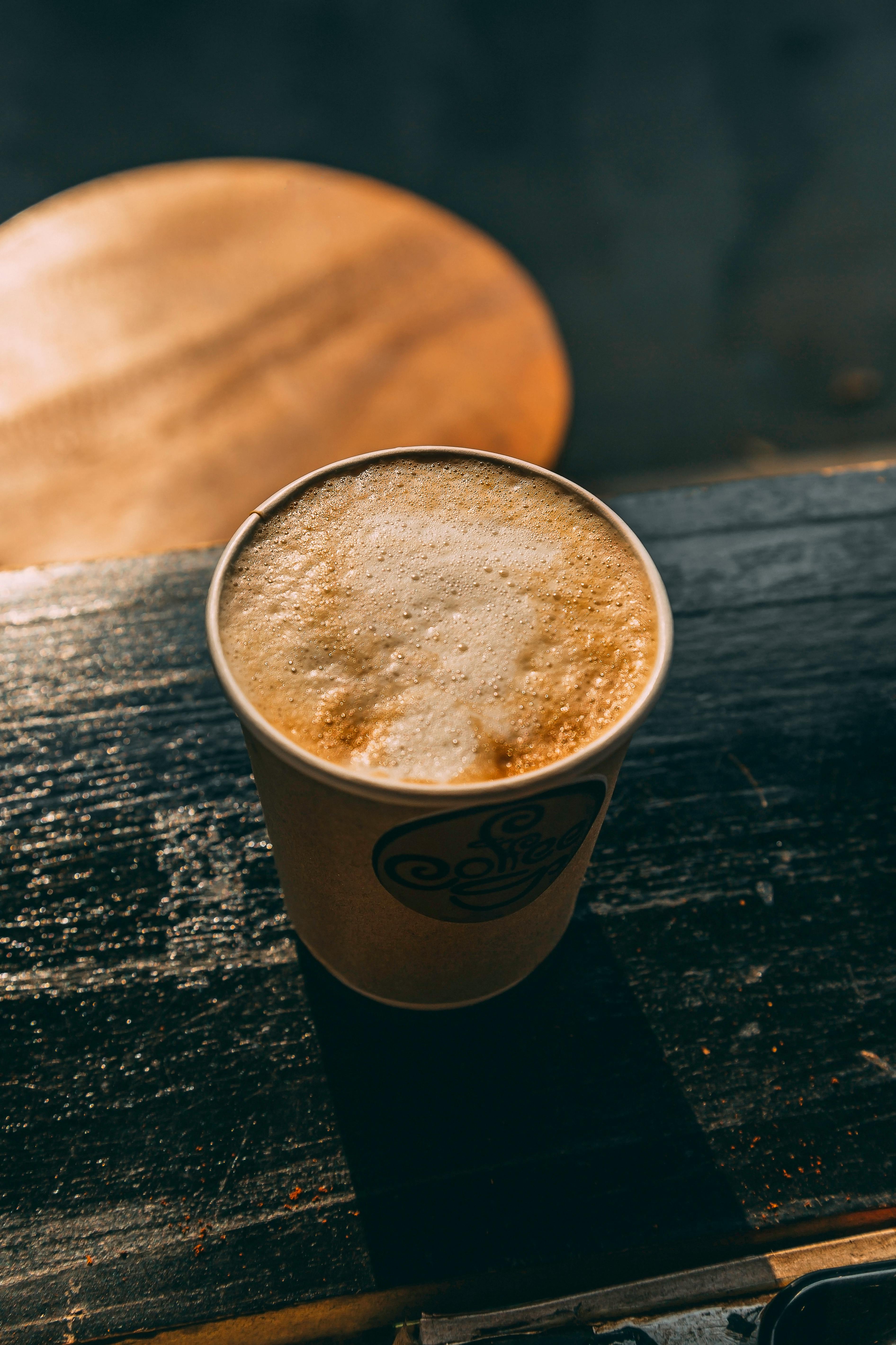 Coffee Filled Plastic Cup · Free Stock Photo
