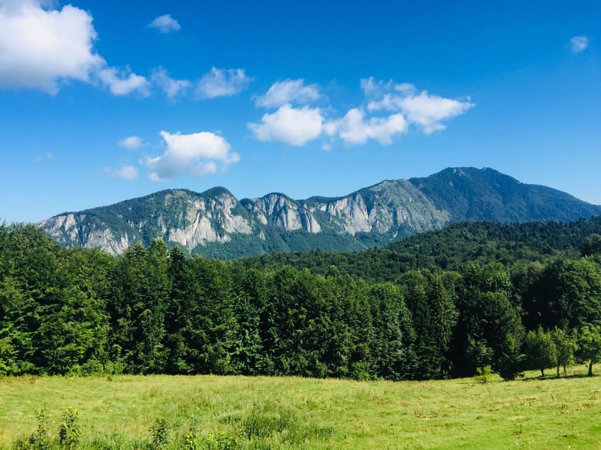 Hikers enjoying a trail in the majestic Carpathian Mountains of Romania