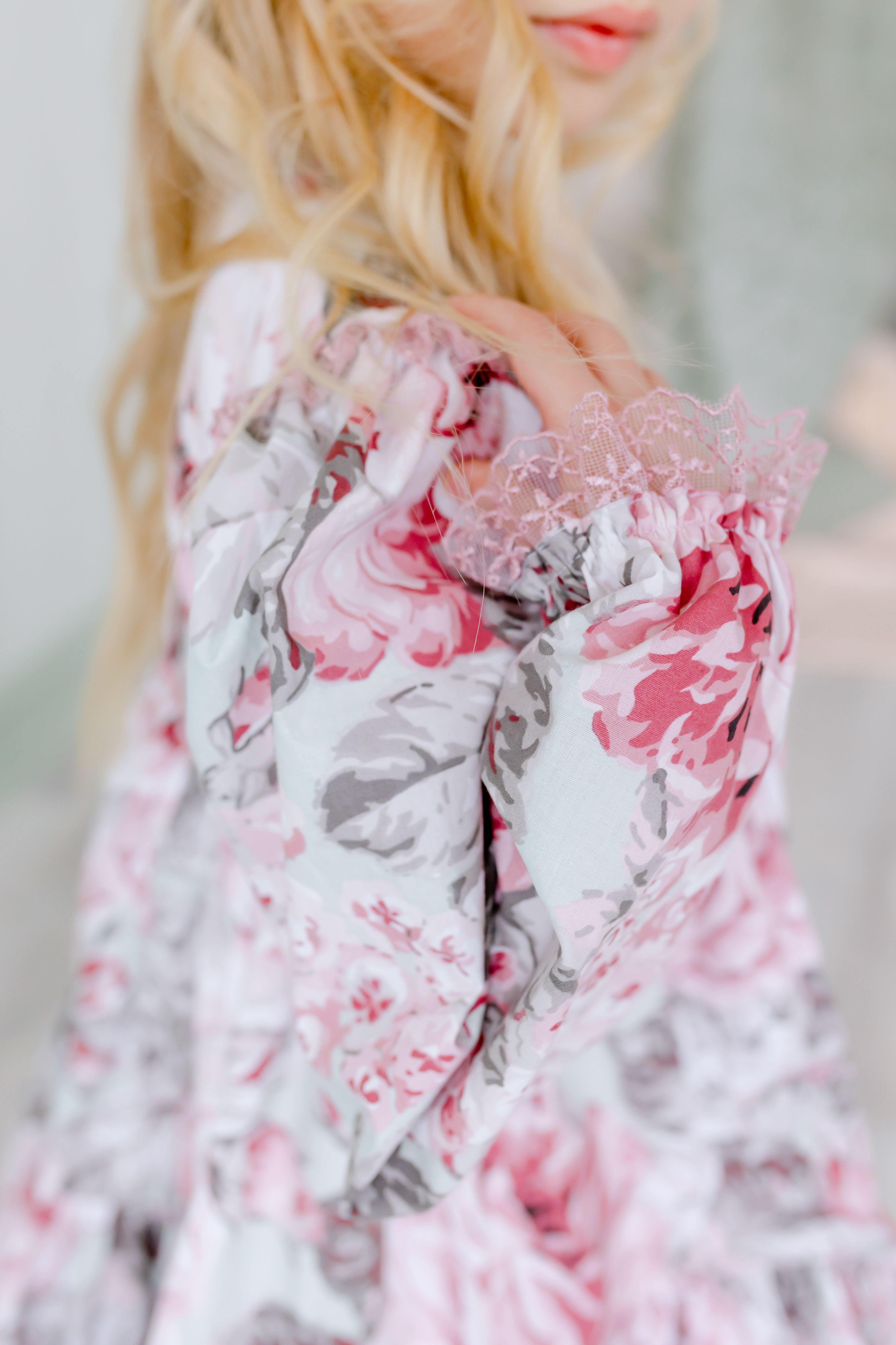 Woman in Floral Dress Sitting on Chair · Free Stock Photo
