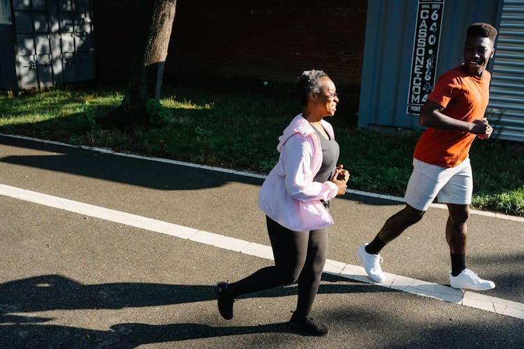 Woman And Man Jogging