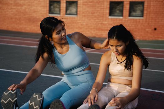 Mom Encouraging Daughter to Exercise Stretching